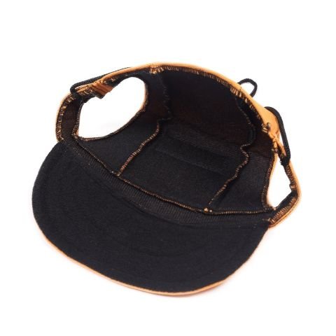 Casquette pour chien / Marley, vue de l'intérieur avec visière noire et bord orange.