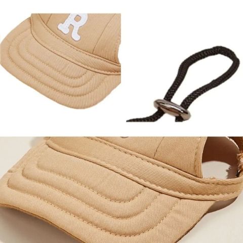 Casquette chien Rosco avec sangle noir et bouton métallique, vue rapprochée du bord et détail du capuchon en tissu beige.